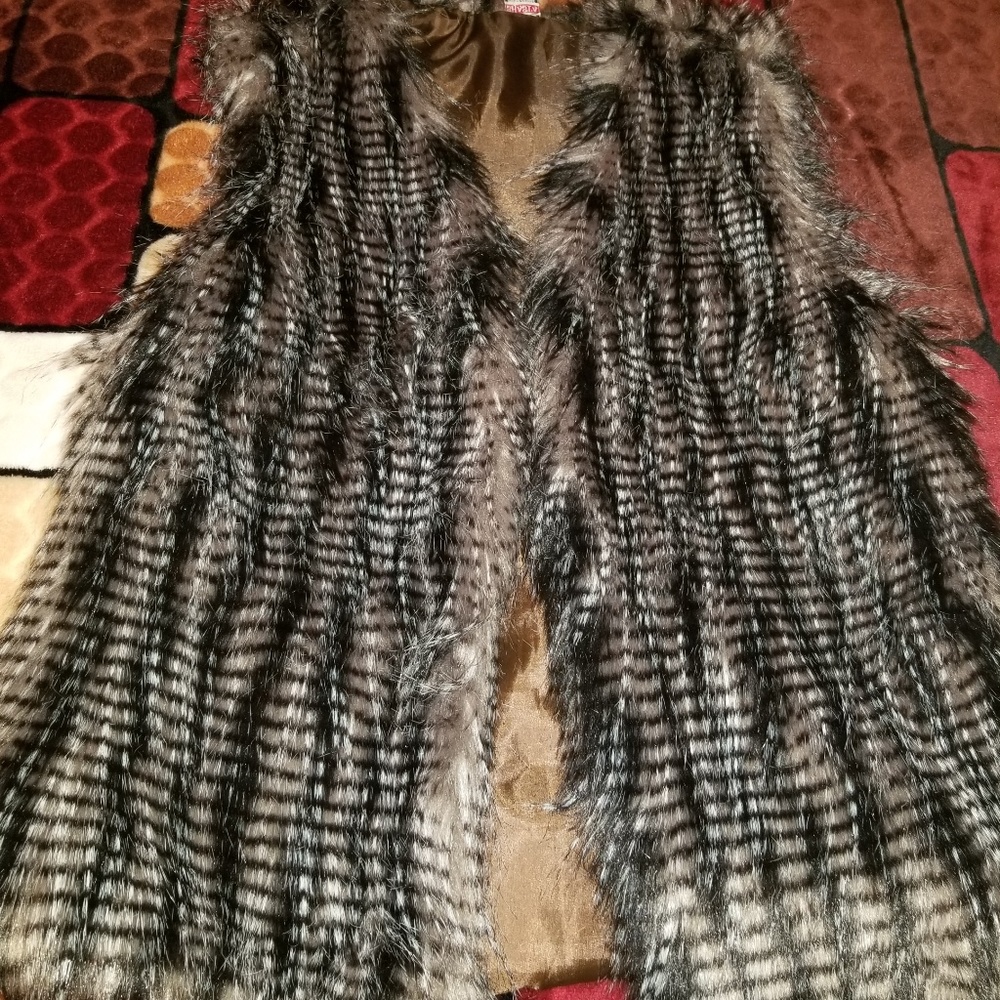 Cute vest. New was never used.